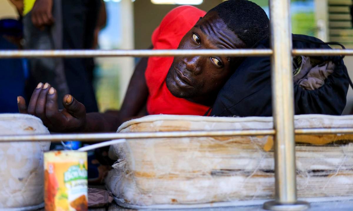 100 migrantes haitianos.